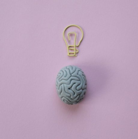 brain with light bulb above